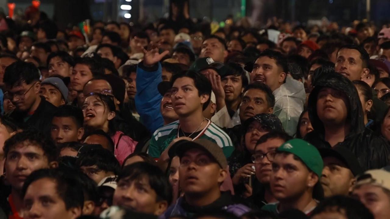 Video thumbnail for Mexico: Mexico fans gather to watch Mexico's World Cup last-16 match against England.