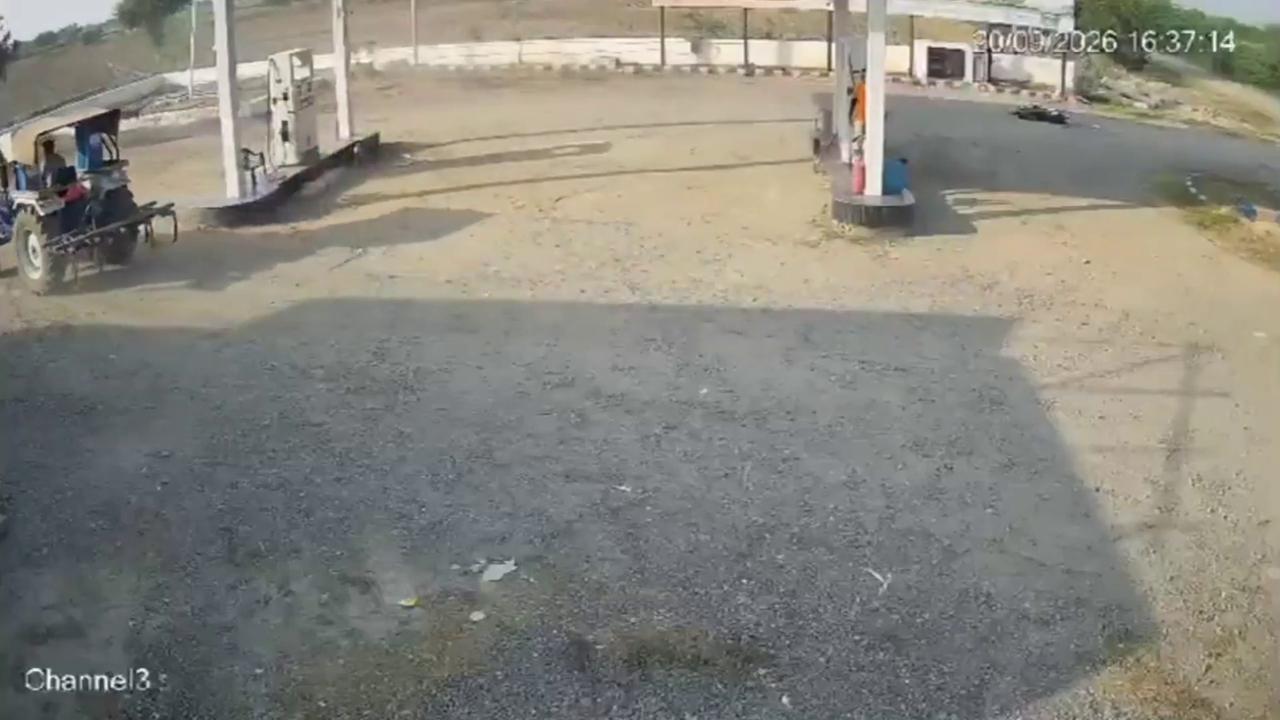 Video thumbnail for India: Biker Escapes as Tractor Hits Motorcycle at Fuel Station in Jaipur.