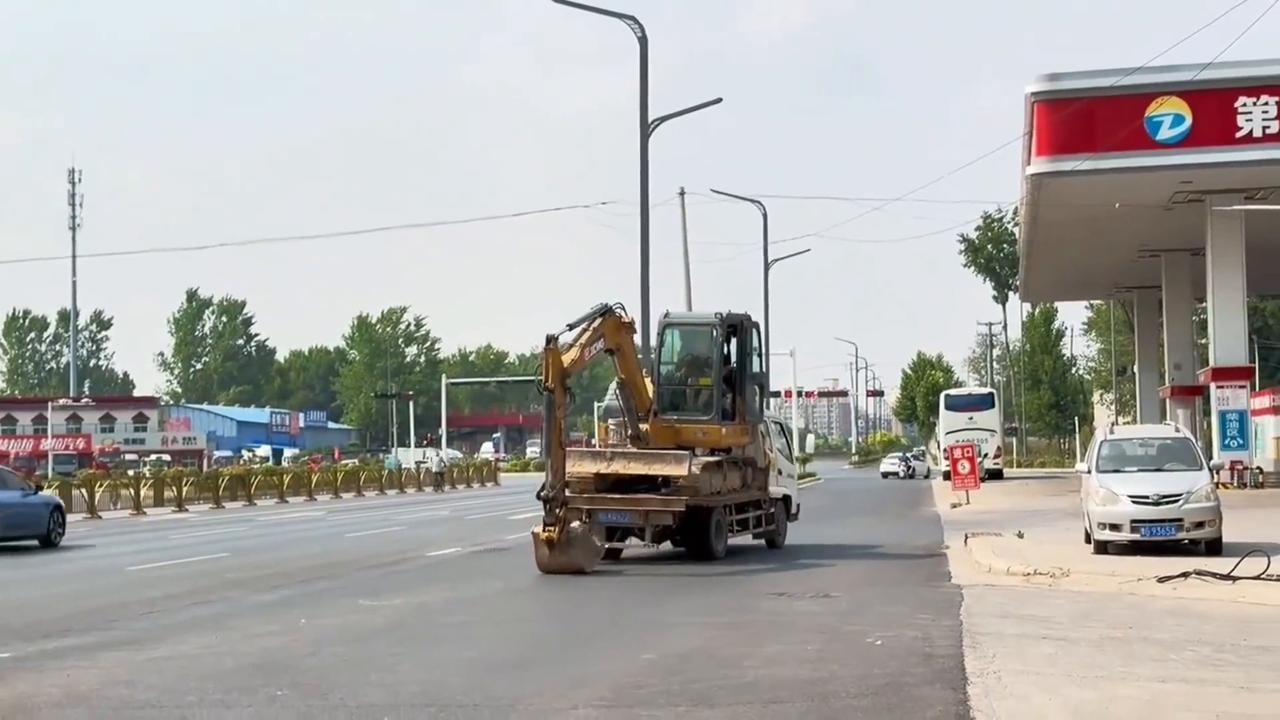 Video thumbnail for China: Excavator in China moves by pushing ground with mechanical arm.