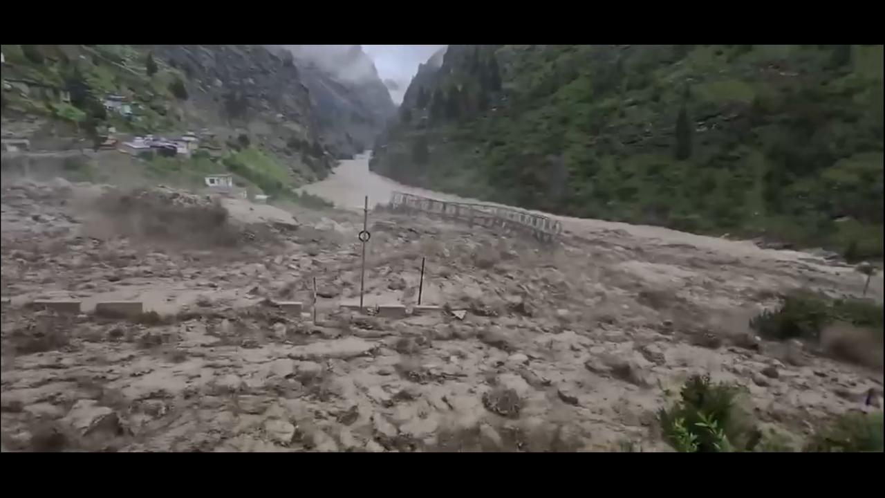 Video thumbnail for India: Chamoli Cloudburst Triggers Flash Floods, Sweeps Away Bridge in Niti Valley.