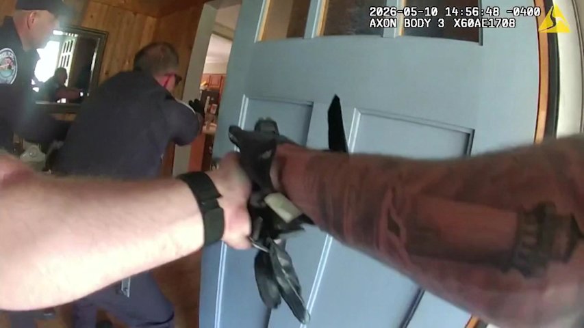 Video thumbnail for Bodycam footage shows police facing blood-covered son accused of stabbing mother over 40 times