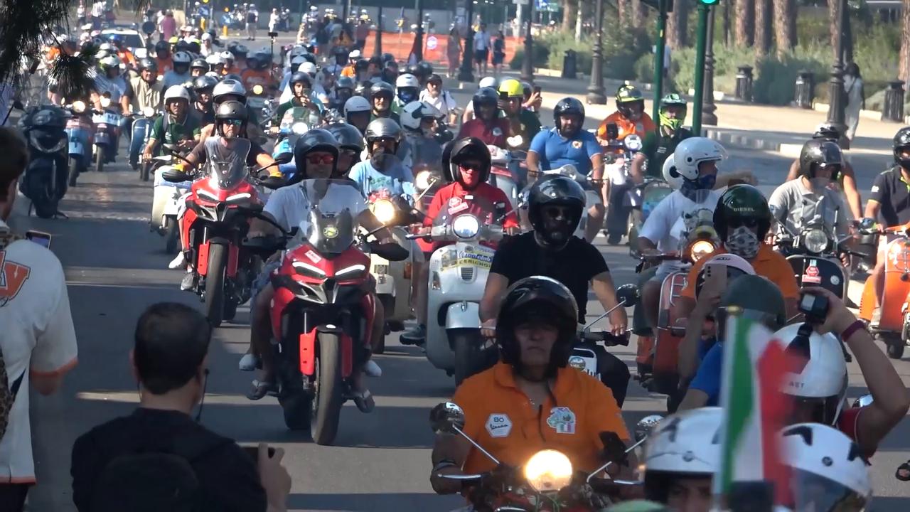 Video thumbnail for Italy: Thousands of Vespa riders take part in motorcycle parade through Italian capital.