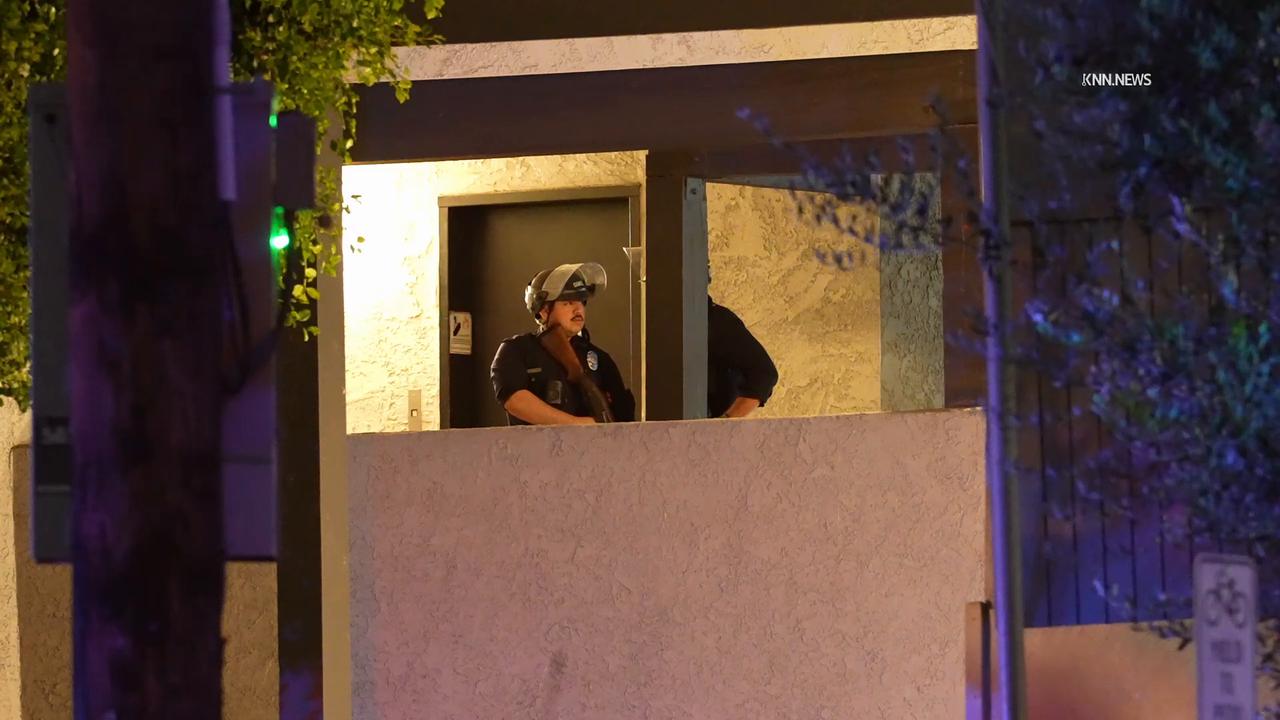 Video thumbnail for US, Los Angeles: Reseda Police Surround Apartment Complex Due to Barricade Situation.