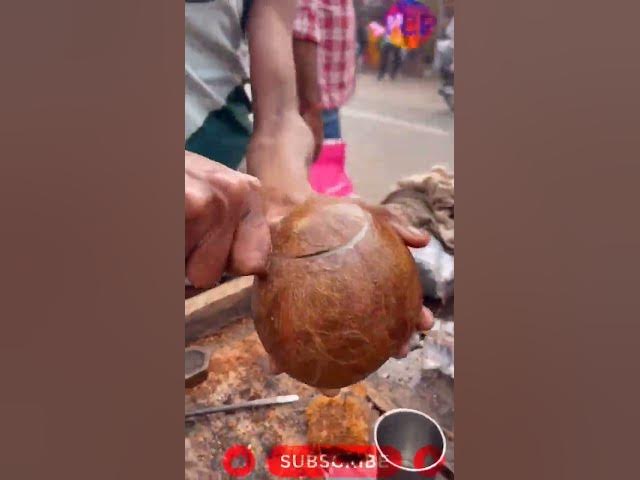 Video thumbnail for coconut peeling skills.