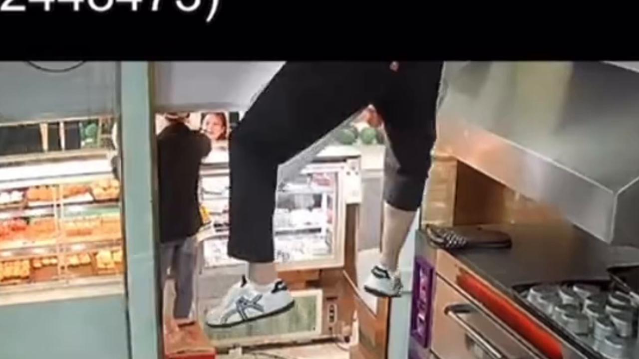Video thumbnail for China: Chinese bakery worker plummets through ceiling in front of stunned customers.