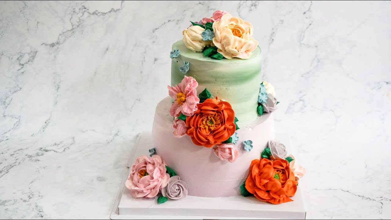 'Video thumbnail for Beautiful flowers on 2 tier birthday cake decoration for love | Délicieux Pie | Shot on iPhone'