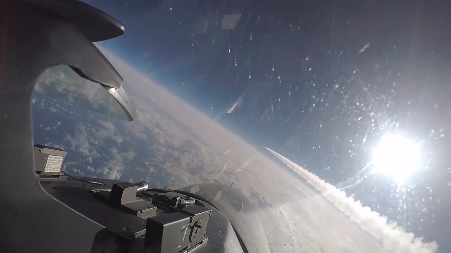 'Video thumbnail for F-16 Flies Through Contrail'