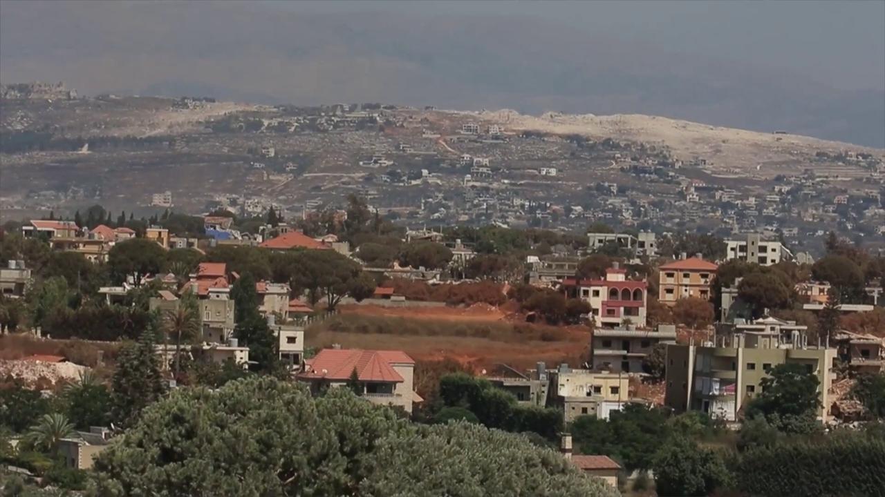 Video thumbnail for Lebanon: Displaced S. Lebanon resident watches home from afar.