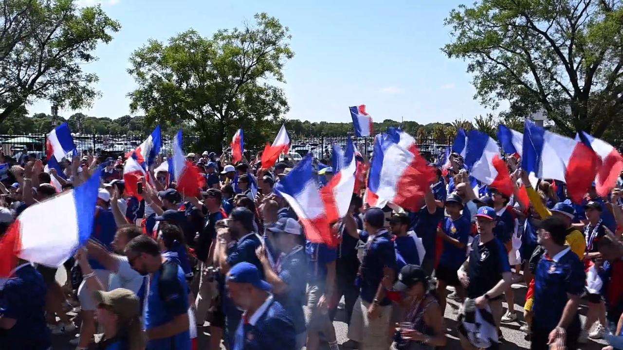 Video thumbnail for US: French fans gather at Philadelphia stadium ahead of World Cup clash with Paraguay (2).