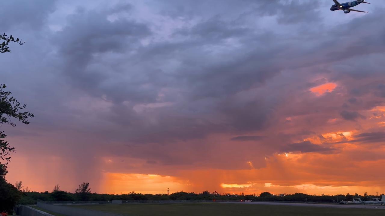 Video thumbnail for US: Airliner flying into stormy sunset.