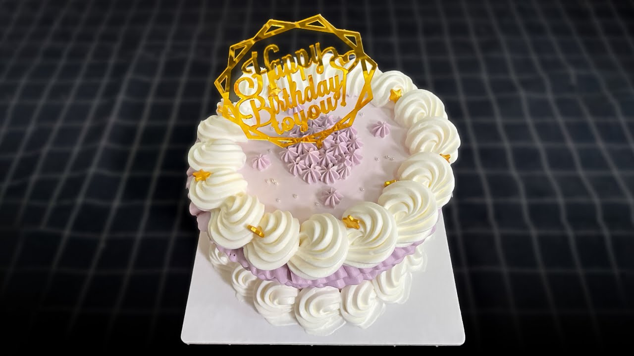 'Video thumbnail for Purple birthday cake decoration for baby'