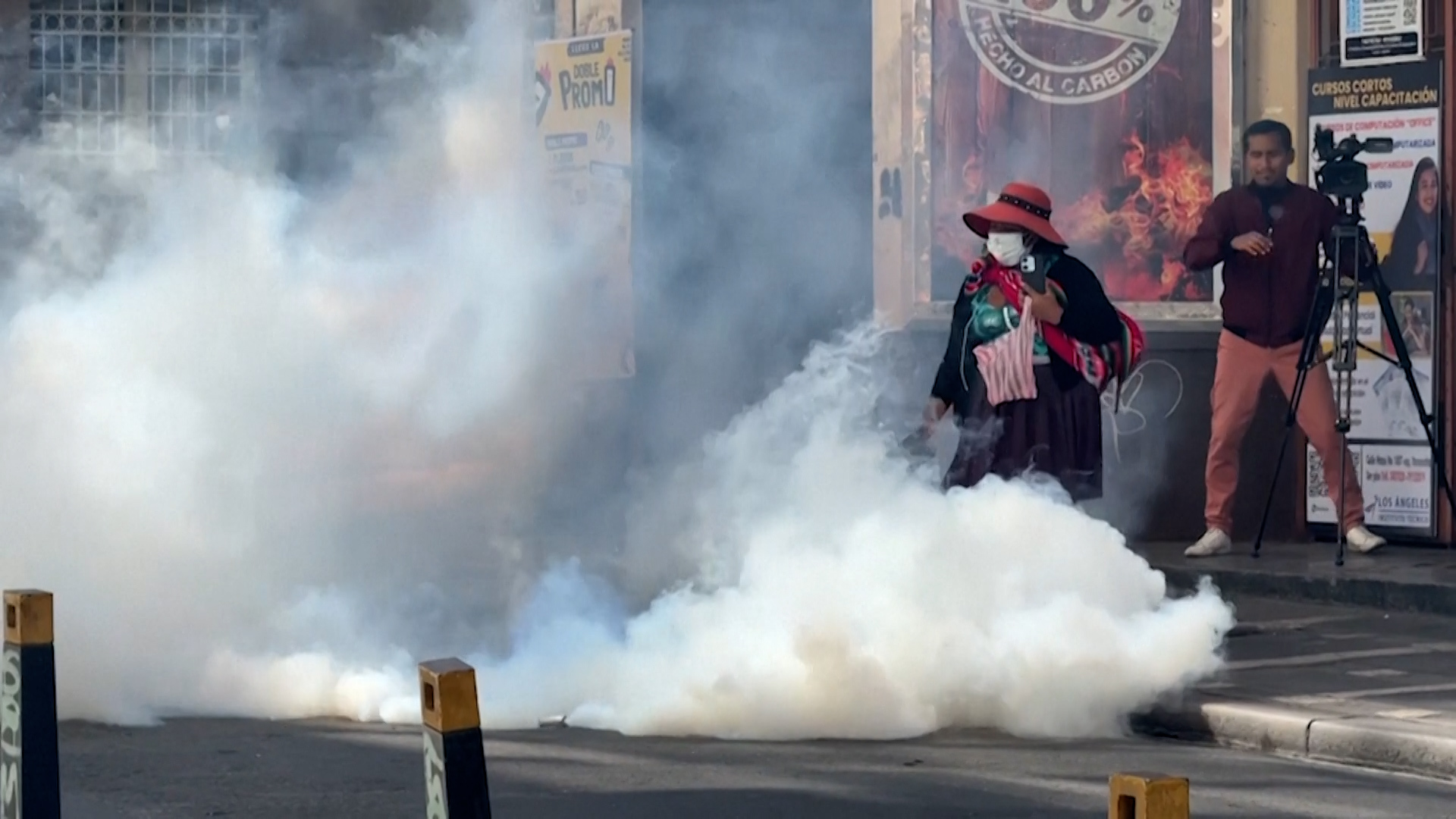 Video thumbnail for Bolivian police fire tear gas at protesting teachers