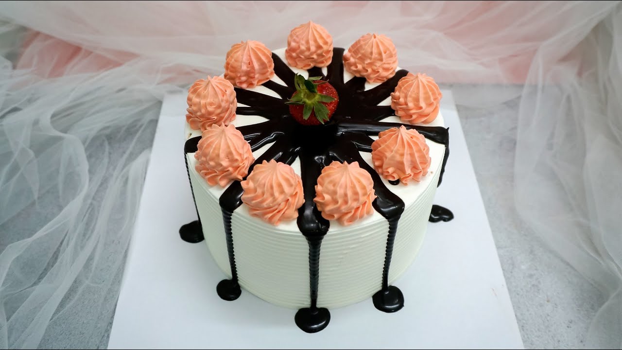 'Video thumbnail for Chocolate drip cake decoration with strawberry and pink cream for birthday'