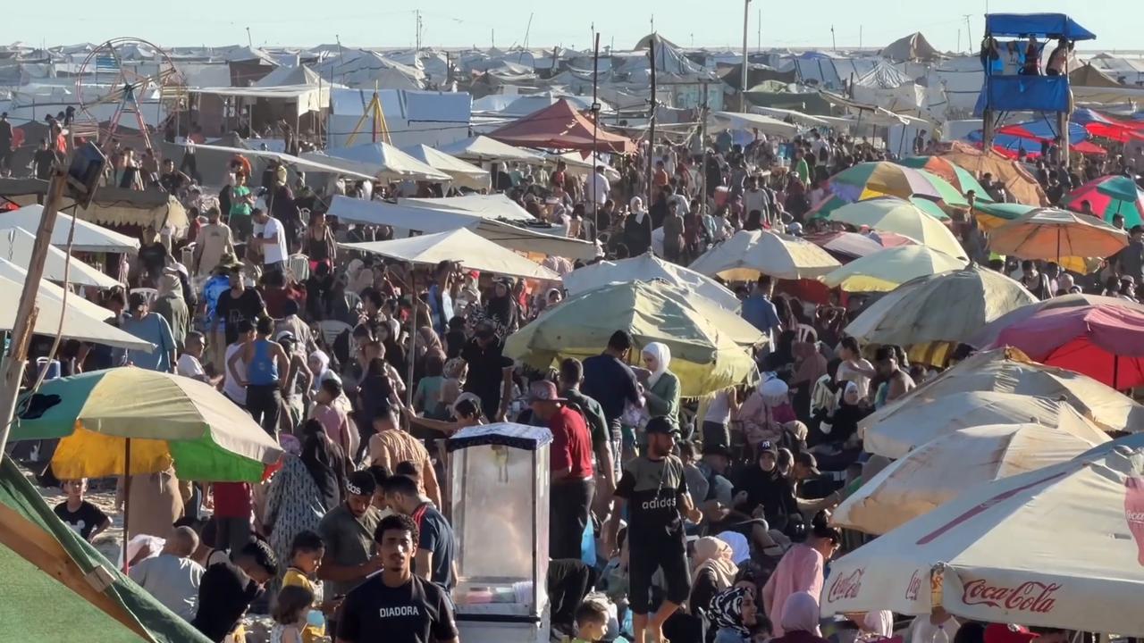 Video thumbnail for Displaced Gazans seek relief at sea as summer heat intensifies.