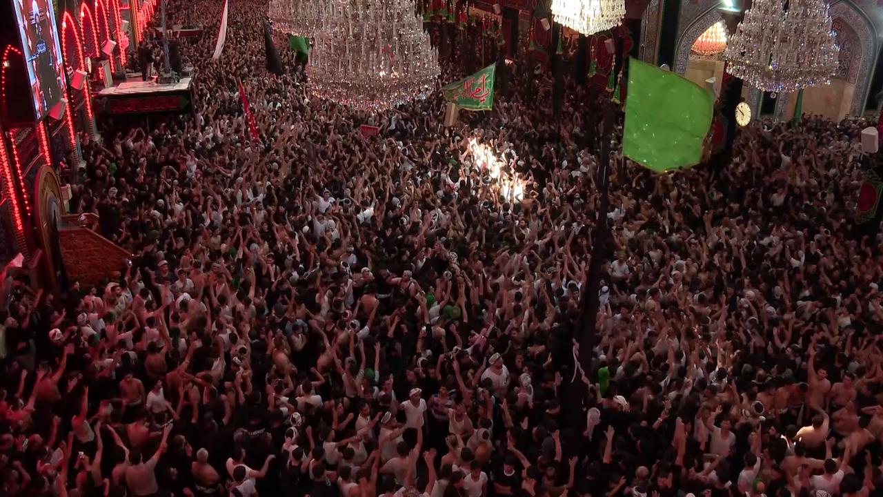 Video thumbnail for Iraq: Thousands visit shrines in Iraq’s Karbala for Arbaeen commemorations.