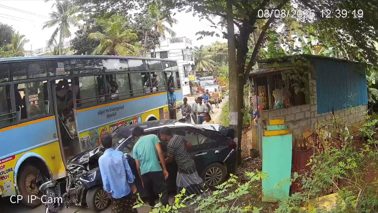 Video thumbnail for India: Narrow passage turns tricky as moving bus crashes into parked car near roadside shop, no injuries reported.