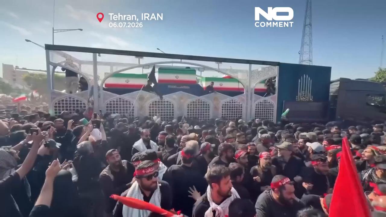 Video thumbnail for Ali Khamenei's coffin carried through the streets of Tehran