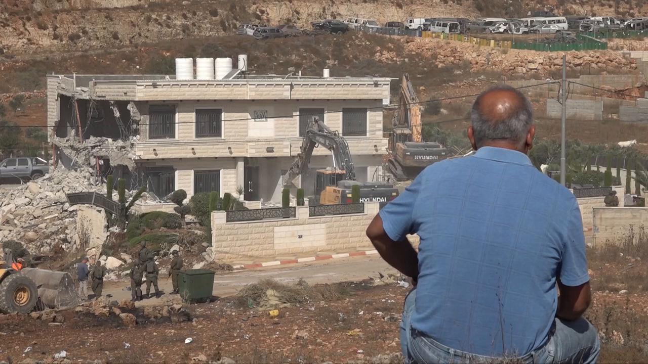 Video thumbnail for Israeli forces demolish two-story home in occupied East Jerusalem.