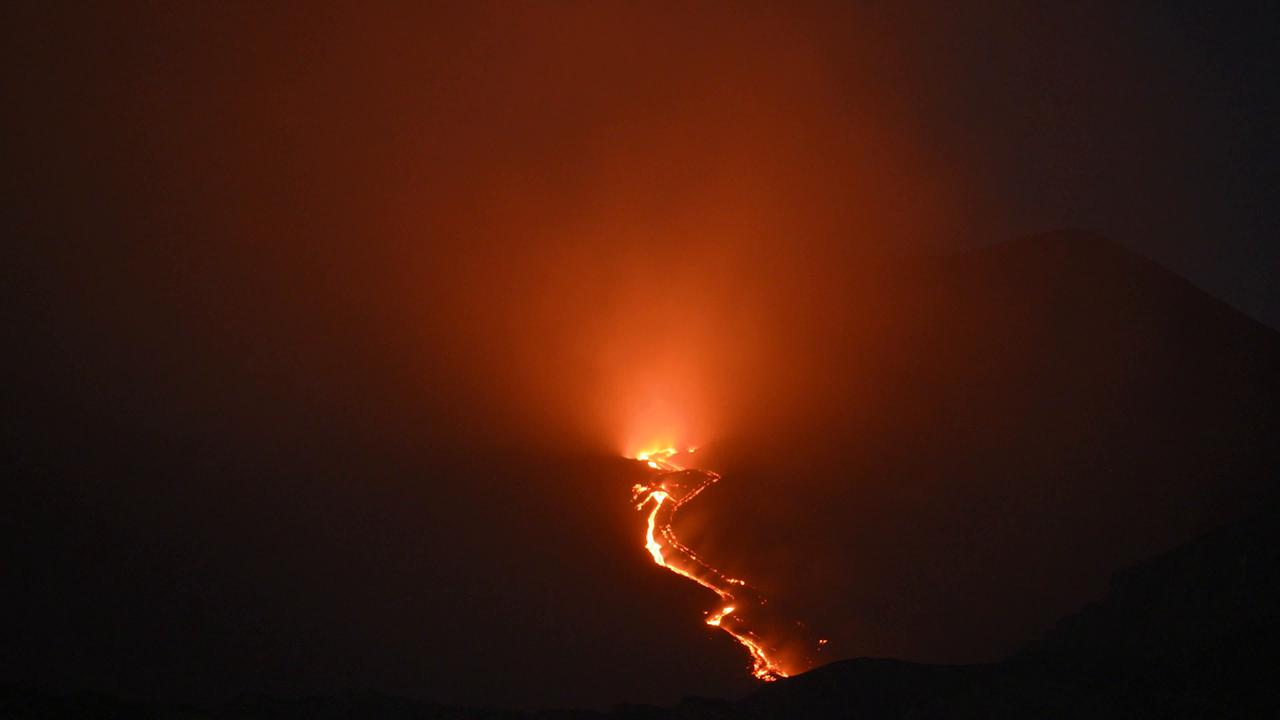 Video thumbnail for Italy: Mount Etna spews ash and lava in Sicily.