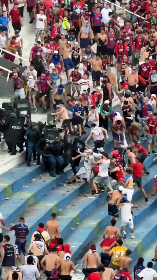 Video thumbnail for Fans fight police at Paraguay football match