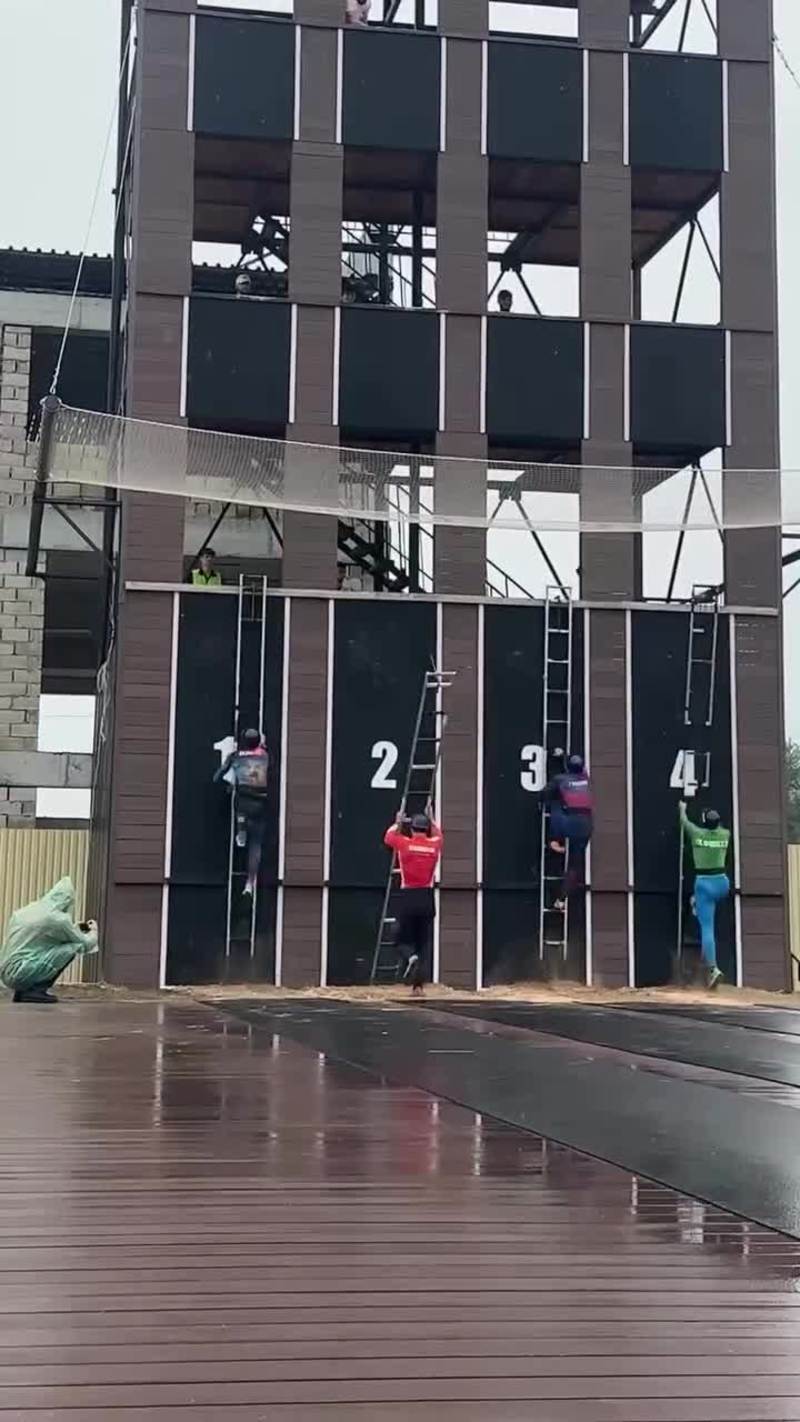 Video thumbnail for Rescue Athletes Sprint Up Tower Ladders in the Rain