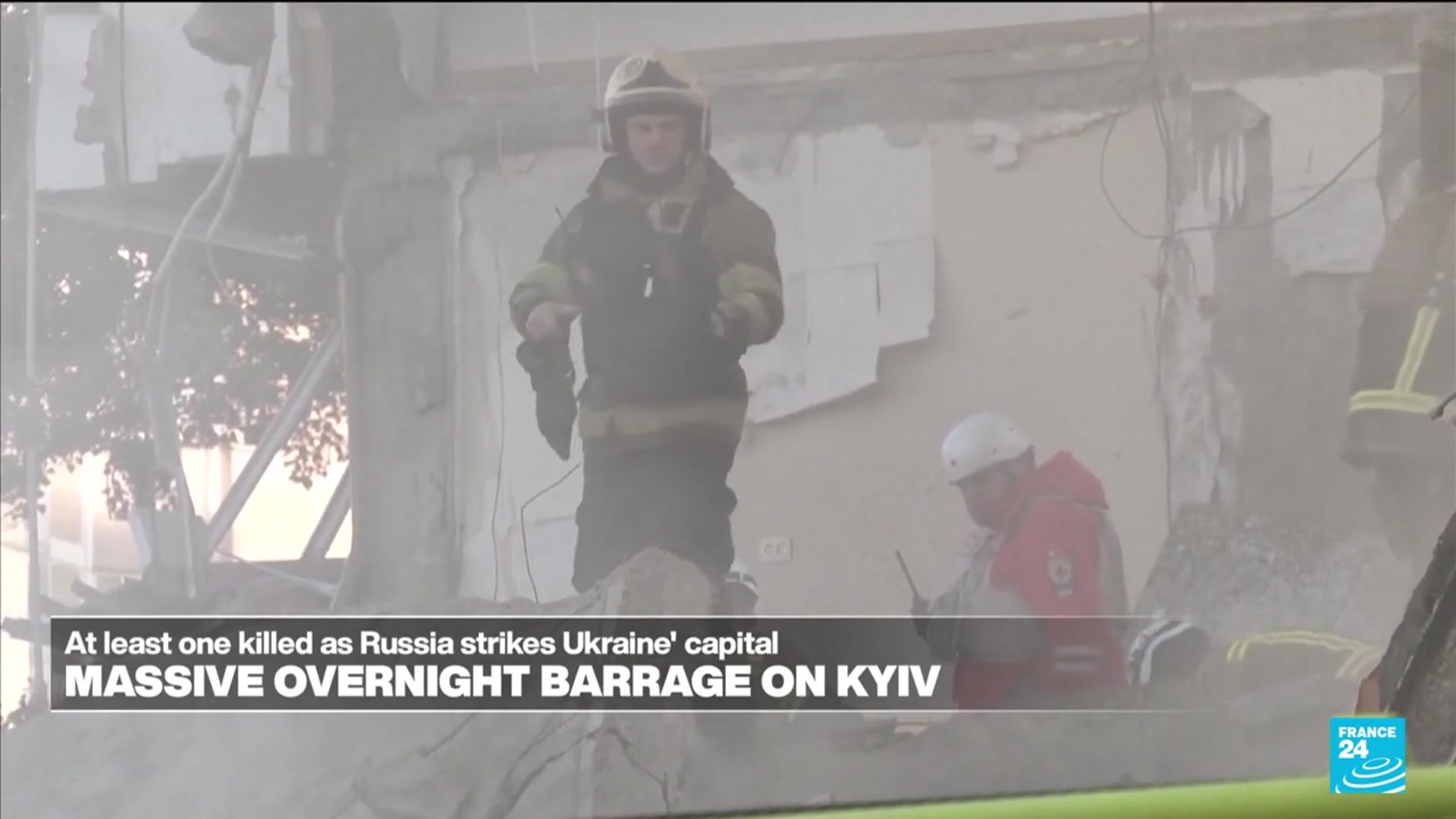 Video thumbnail for A massive overnight barrage on Kyiv splits a residential building in two