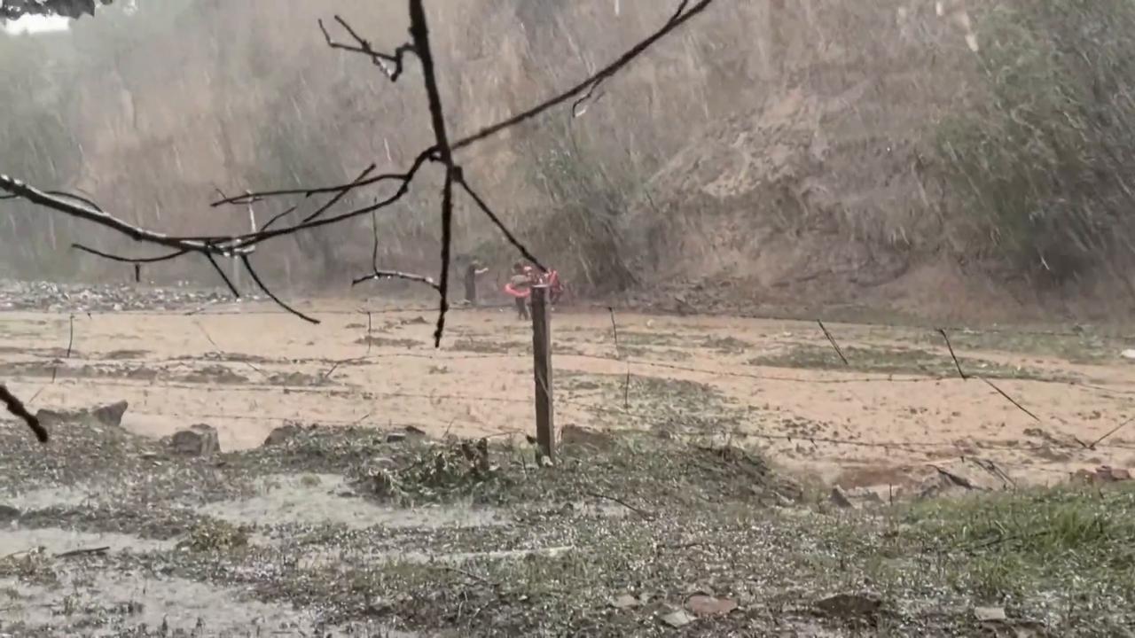 Video thumbnail for China: Firefighters rescue man trapped by flash flood in north China.