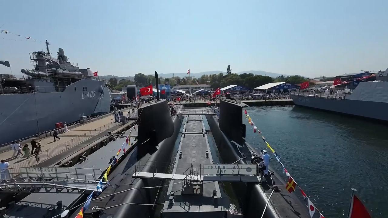 Video thumbnail for Türkiye: FPV drone footage captures TCG Sancaktar during TEKNOFEST Blue Homeland.