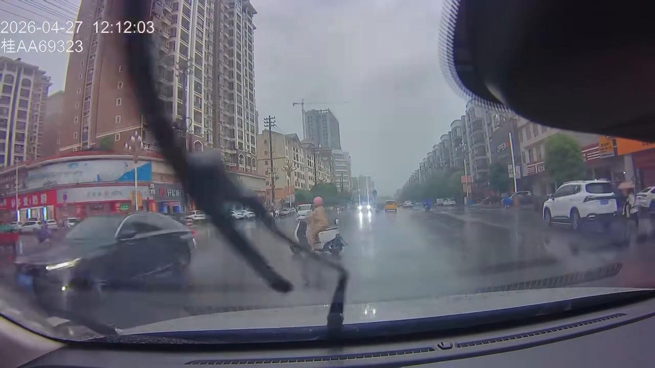 Video thumbnail for China: Lightning strikes ground near buildings during heavy rain in China.