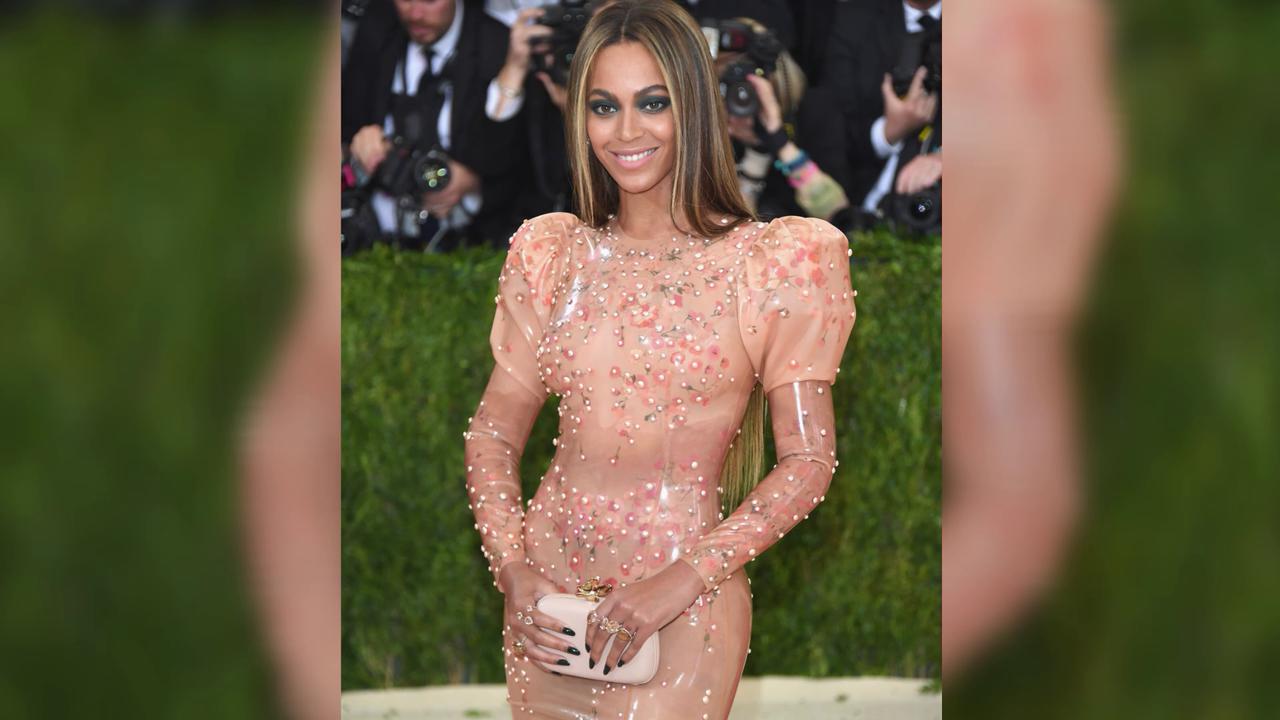 Video thumbnail for IN CASE YOU MISSED IT: Beyoncé dazzles in crystal-studded skeleton-inspired gown at 2026 Met Gala.