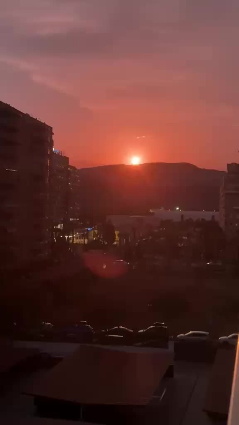 Video thumbnail for Fiery Sunset over the City Skyline and Distant Hills