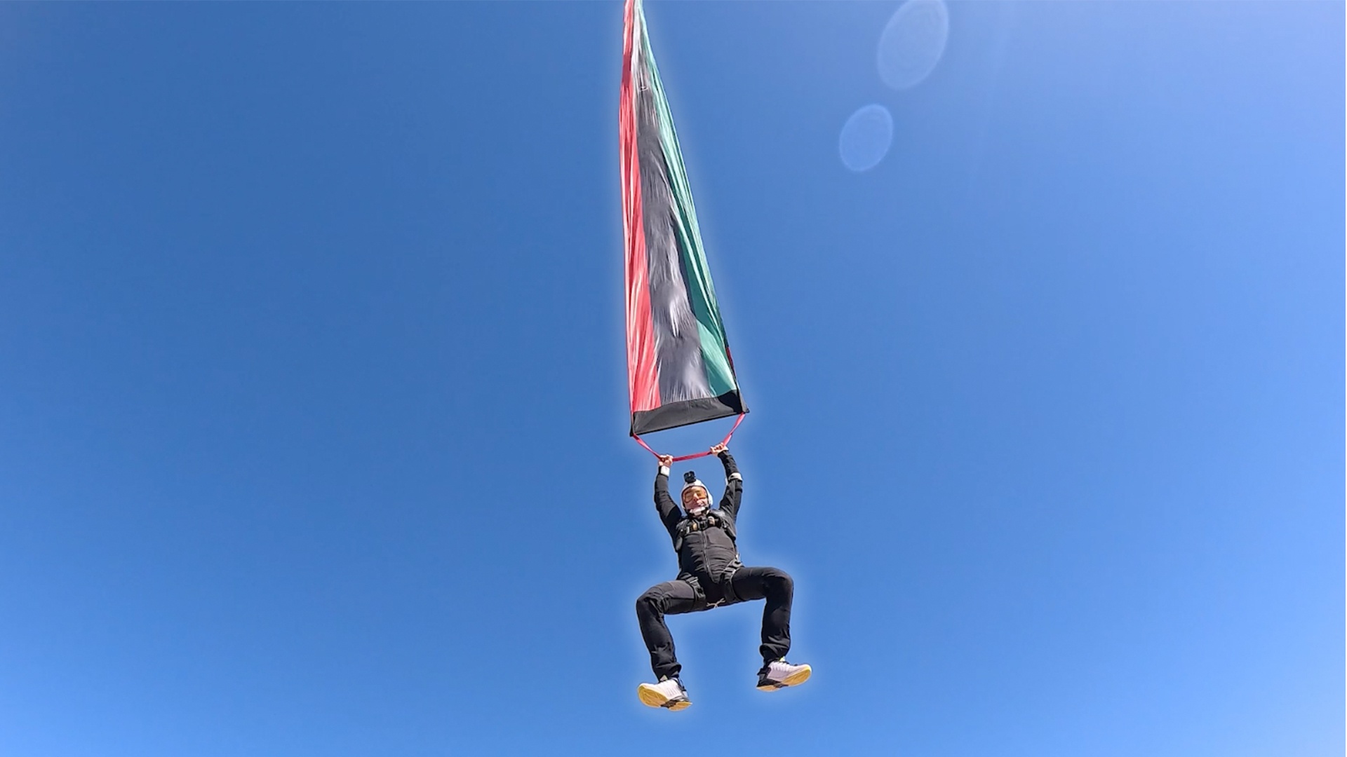 Video thumbnail for Longest party streamer used in a freefall - 101 metres (331.36 ft) by Skydive Benghazi