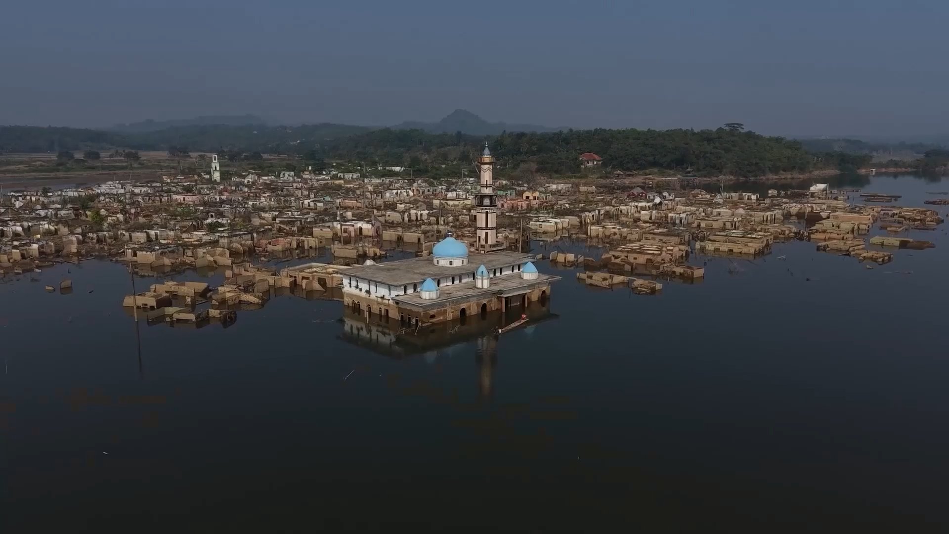 Video thumbnail for Submerged Indonesian village re-emerges as drought lowers water levels