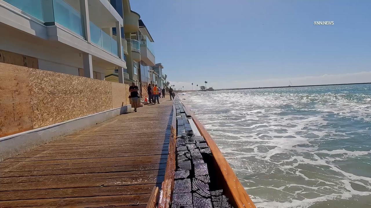 Video thumbnail for US, Los Angeles: Long Beach Waves Pound Boardwalk Near Homes Part 1.