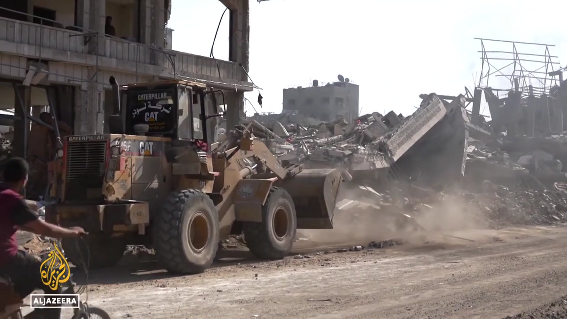 'Video thumbnail for Bulldozers clear rubble in Gaza City as Palestinians return to rebuild homes and lives'
