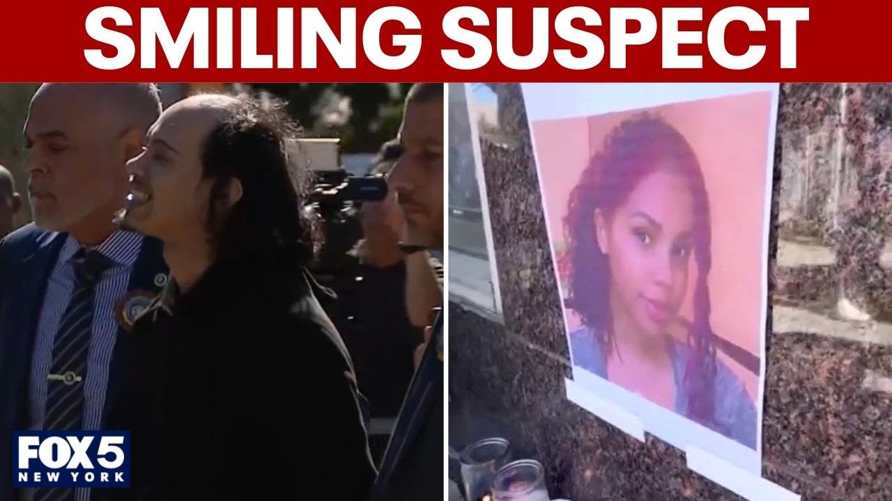 Video thumbnail for Suspect accused of shoving mother, baby off balcony smiles as police escort him