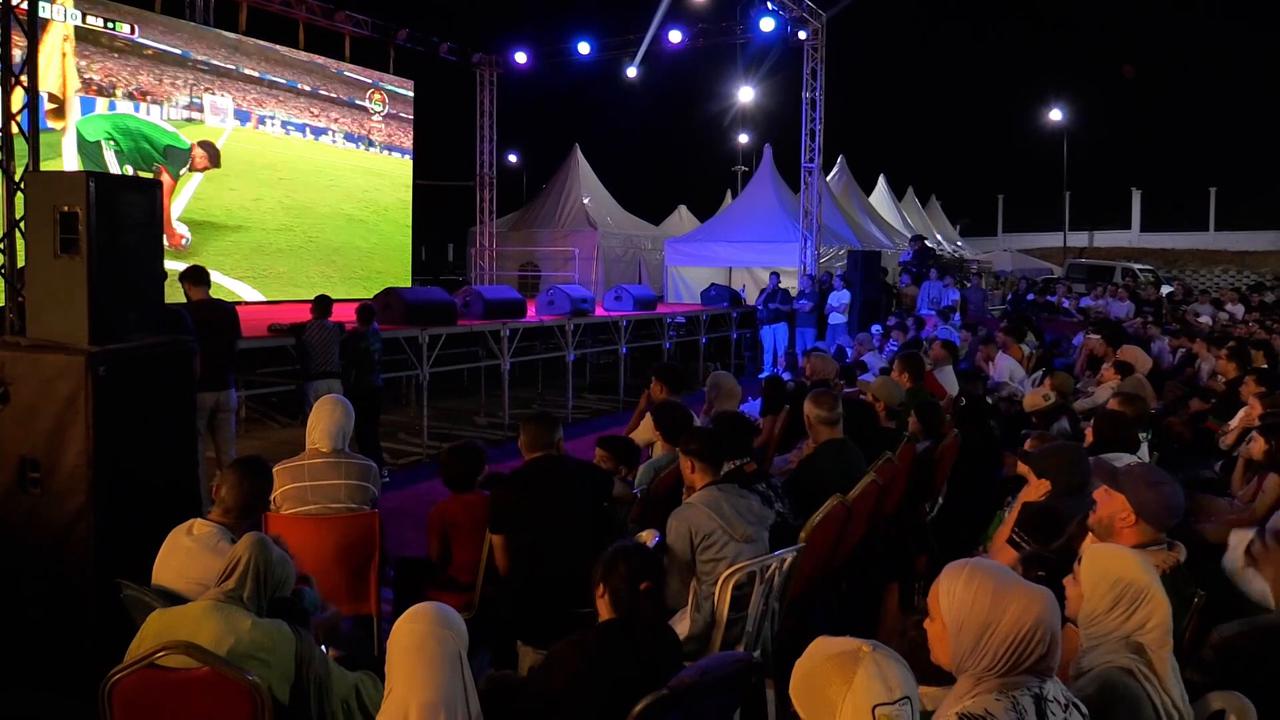 Video thumbnail for Algeria: Algerian fans pack Algiers square to Watch World Cup clash against Argentina.