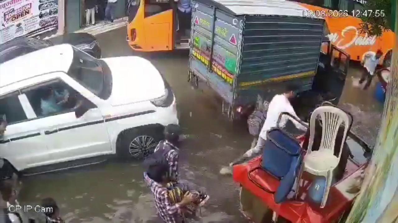 Video thumbnail for India: Three children pulled to safety as open drains trigger fresh safety concerns during Delhi rains.