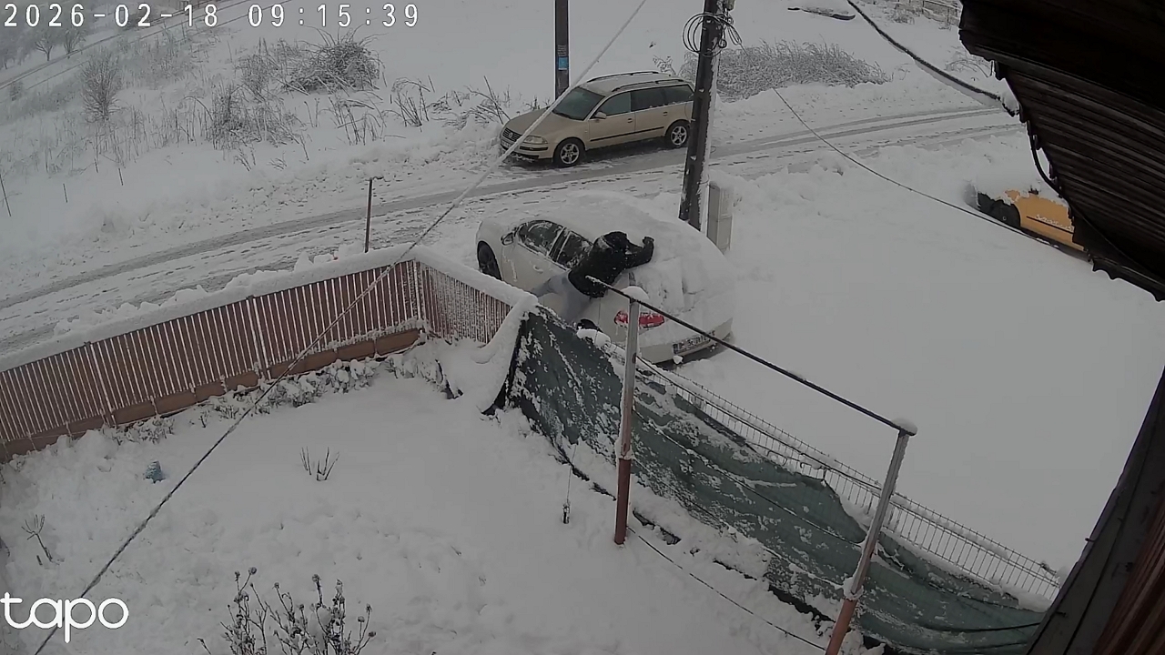Video thumbnail for Teen Takes a Snowy Tumble While Clearing Car