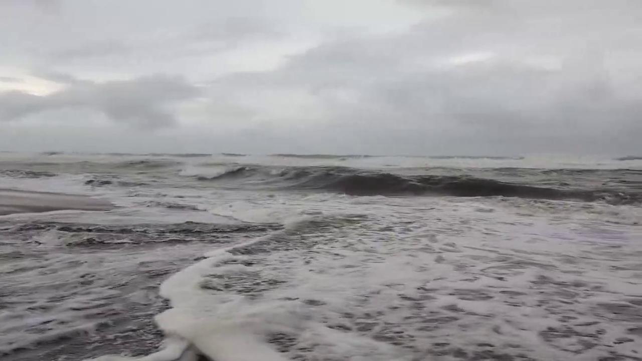 Video thumbnail for US: Choppy Waves Wash Over Outer Banks Beach as Isaias Remnants Move North.