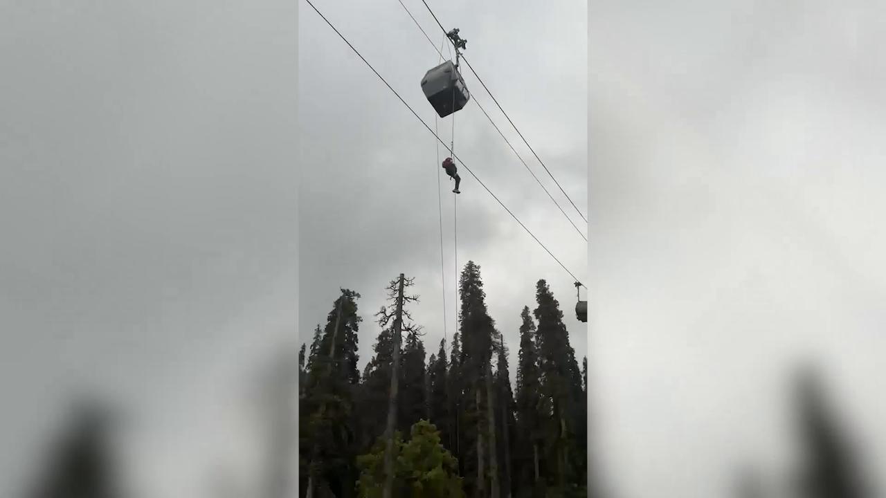 Video thumbnail for Sudden cable car suspension leaves tourists stranded mid-air as officials launch massive rescue mission.