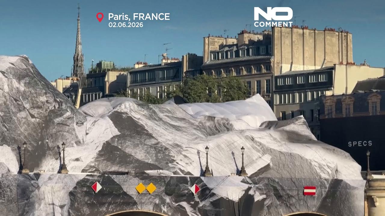 Video thumbnail for French artist JR's giant 'cave' installation in Paris appears damaged