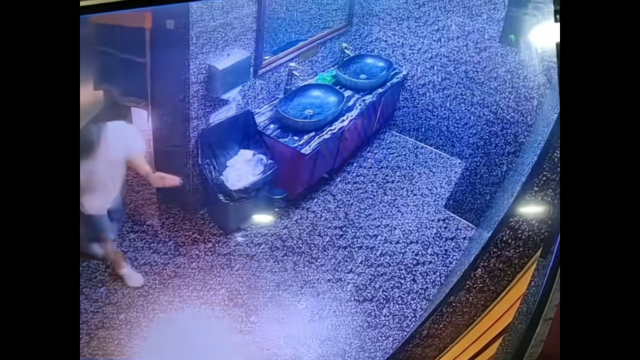 Video thumbnail for Man slips and pulls sink loose while dancing in Chongqing restroom