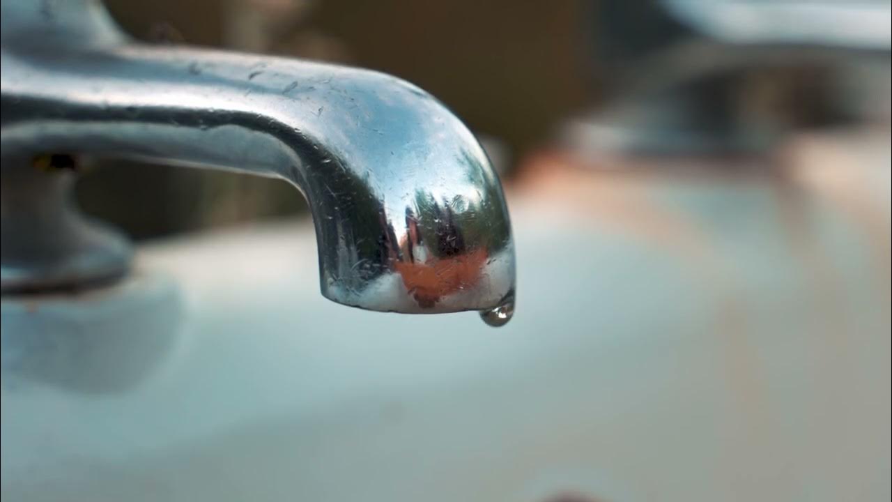 'Video thumbnail for Example of surface tension | Water dropping from tap forms a bubble due to surface tension'