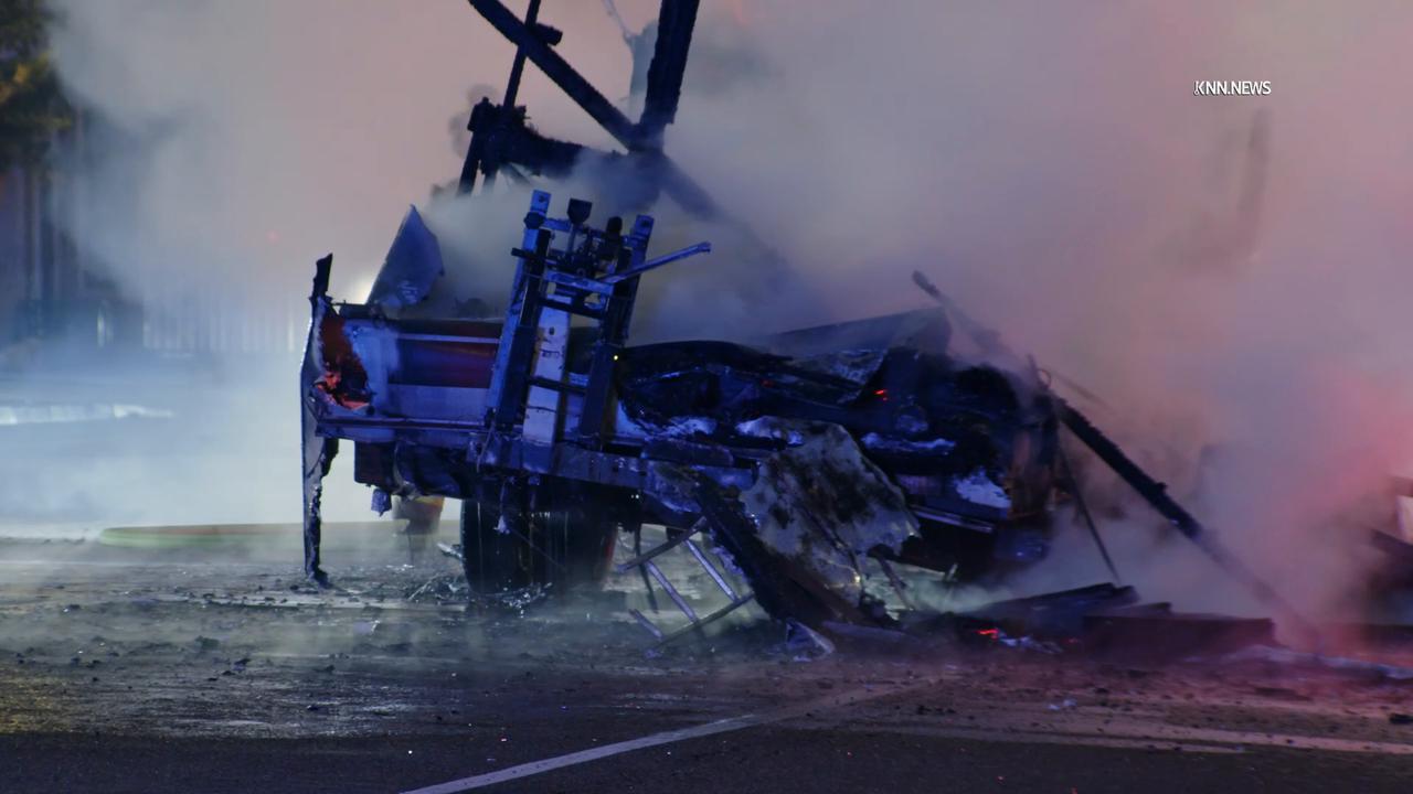 Video thumbnail for US, Los Angeles: Long Beach RV Ablaze In Middle Of Road.