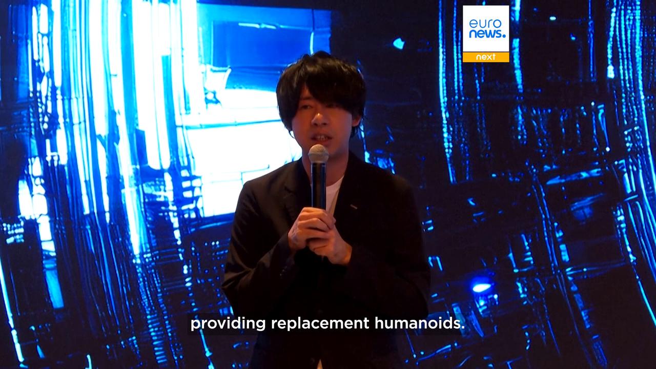 Video thumbnail for Japanese company unveils 'robot ambulance' for on-site humanoid repairs