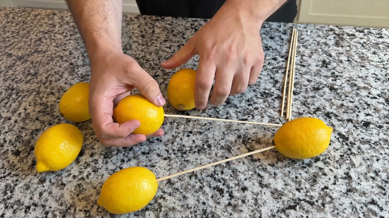 Video thumbnail for He Pushed Wooden Skewers Through Lemons For This Kitchen Countertop Idea