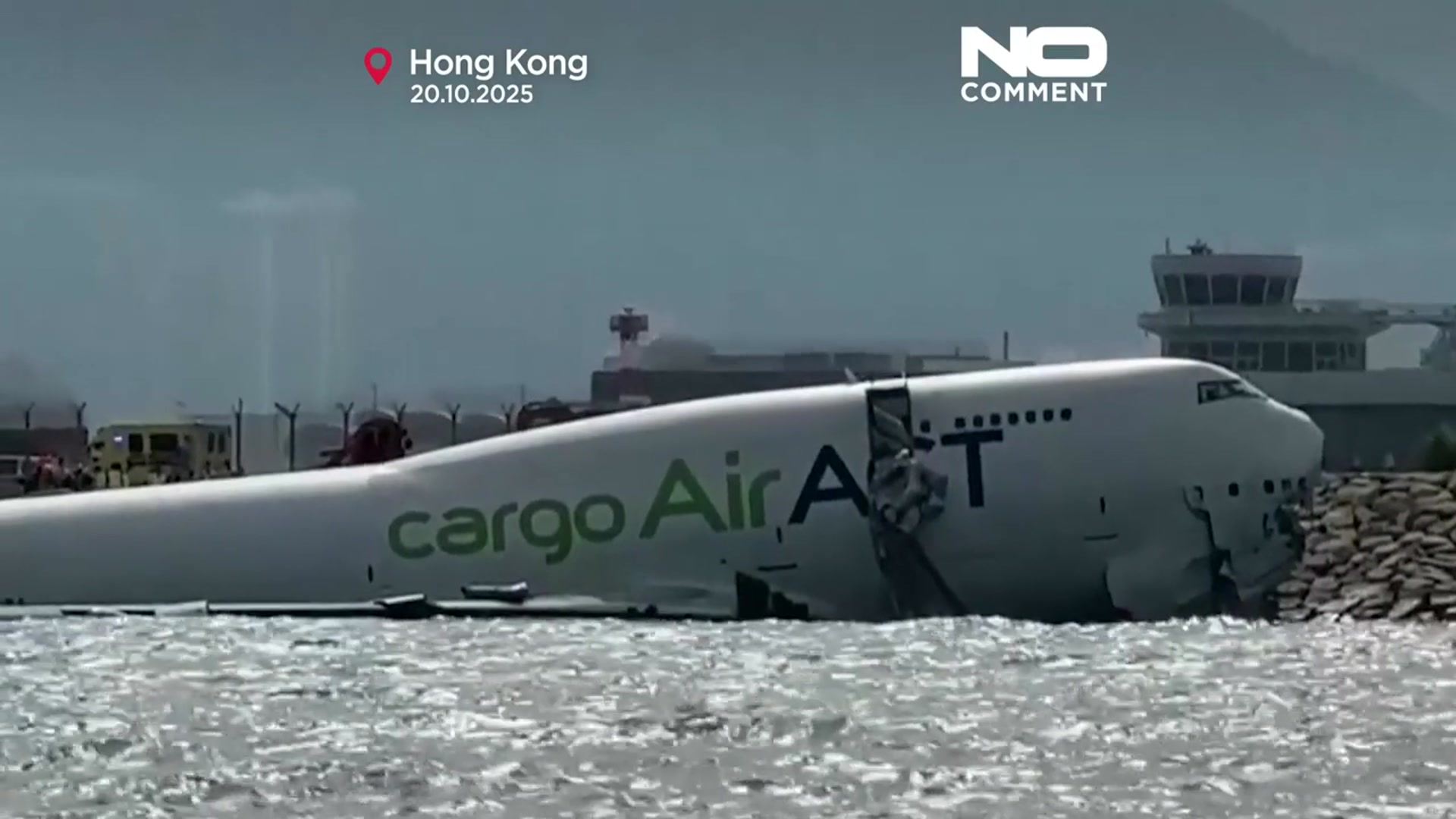 'Video thumbnail for Cargo plane skids off Hong Kong runway, killing two airport workers'