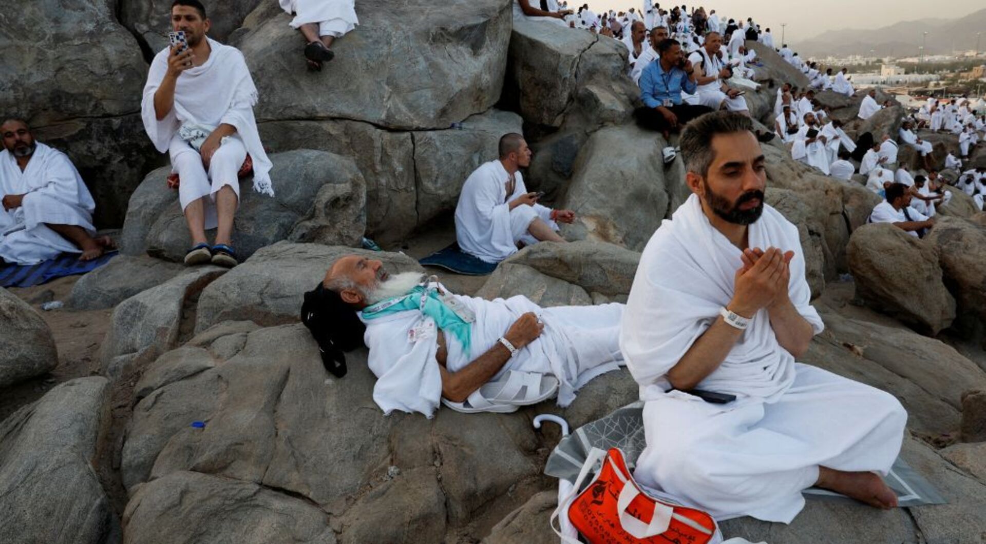 Video thumbnail for Pilgrims gather at Mount Arafat for the most sacred day of Hajj as temperatures top 40C