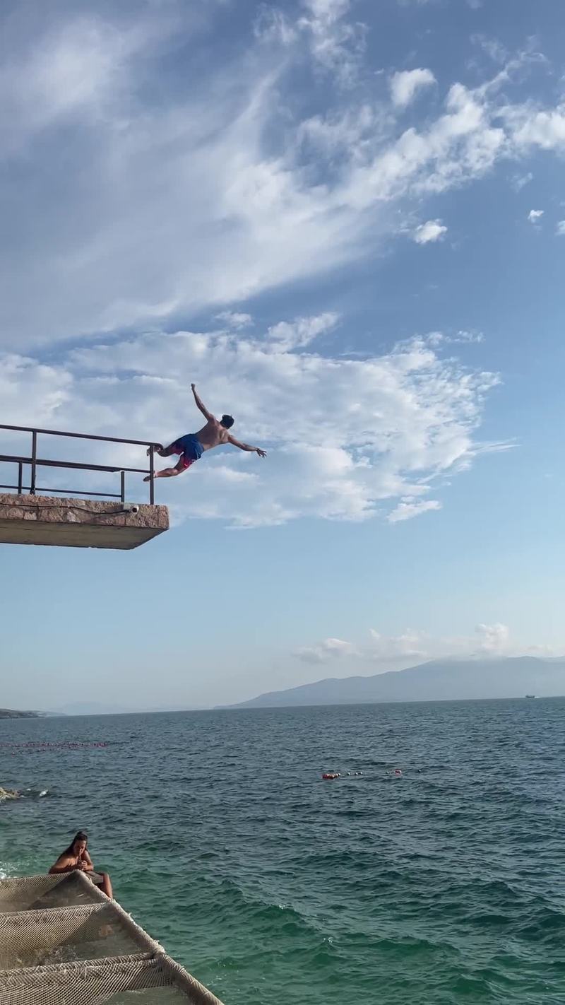 Video thumbnail for Epic Double Flip off a Coastal Pier into Crystal Blue Sea